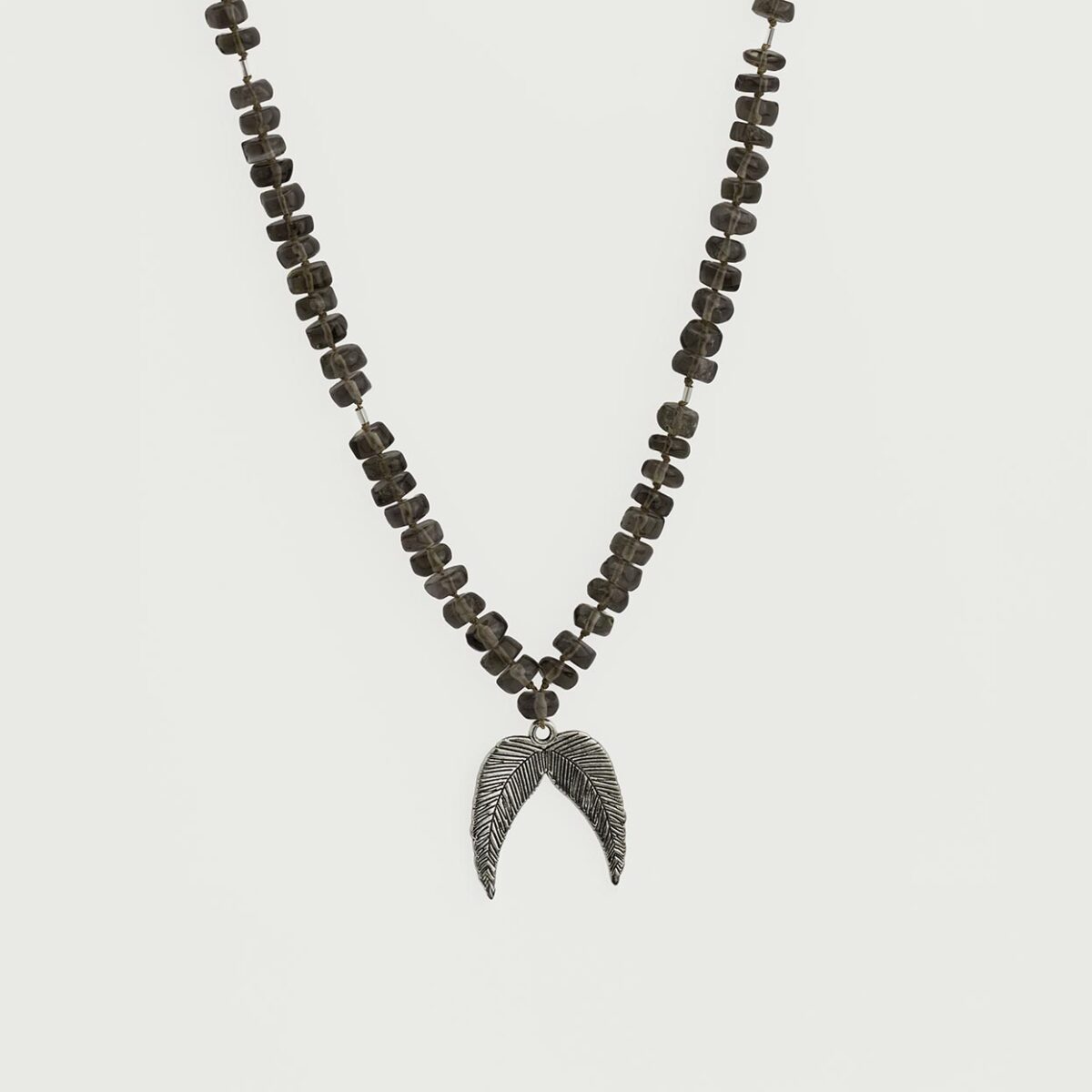 Silver wing gemstone necklace featuring faceted smoky quartz beads hand-strung on silk thread, accented with a sterling silver angel wing charm
