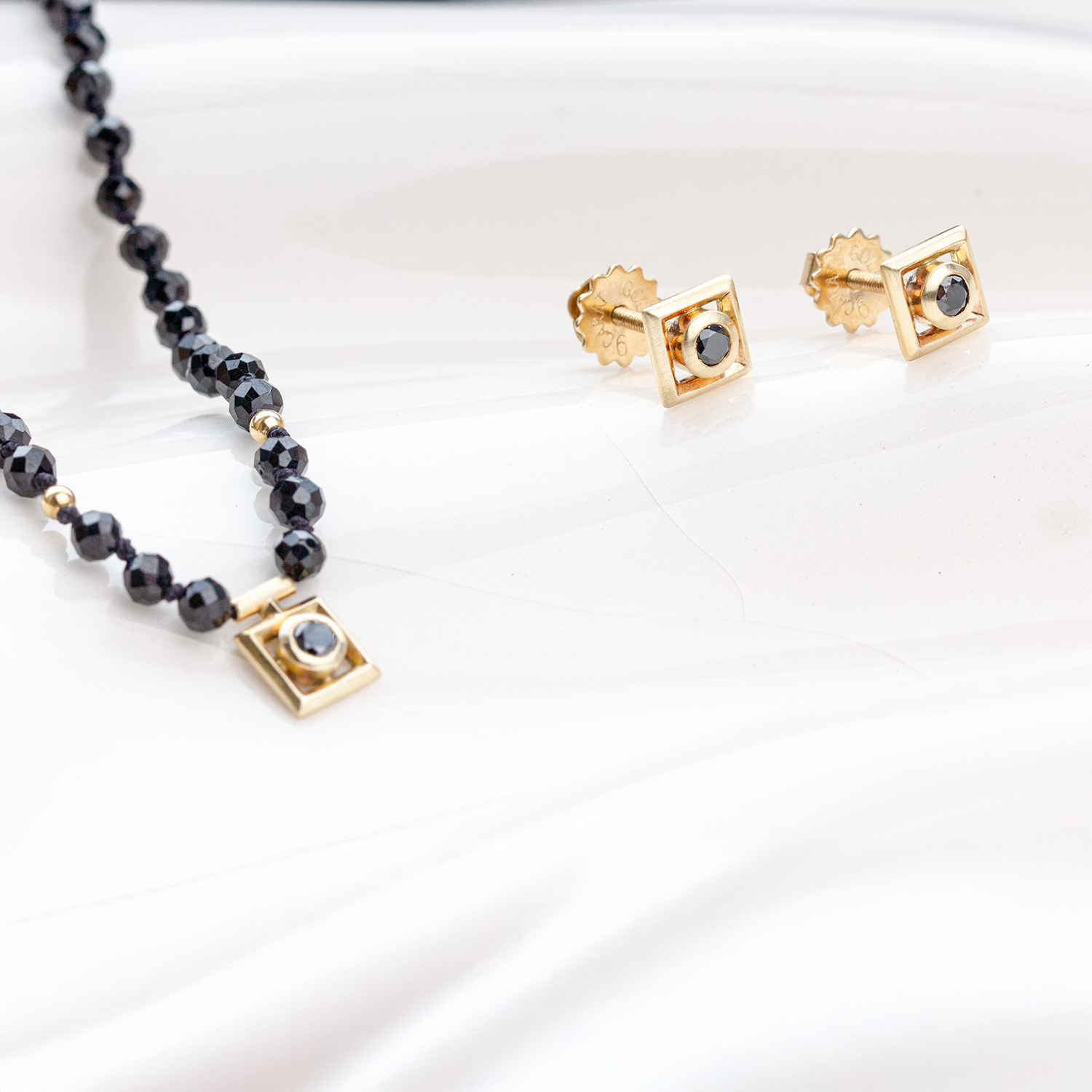 Black diamond and black spinel necklace with matching gold stud earrings, handcrafted AMONTA jewellery set
