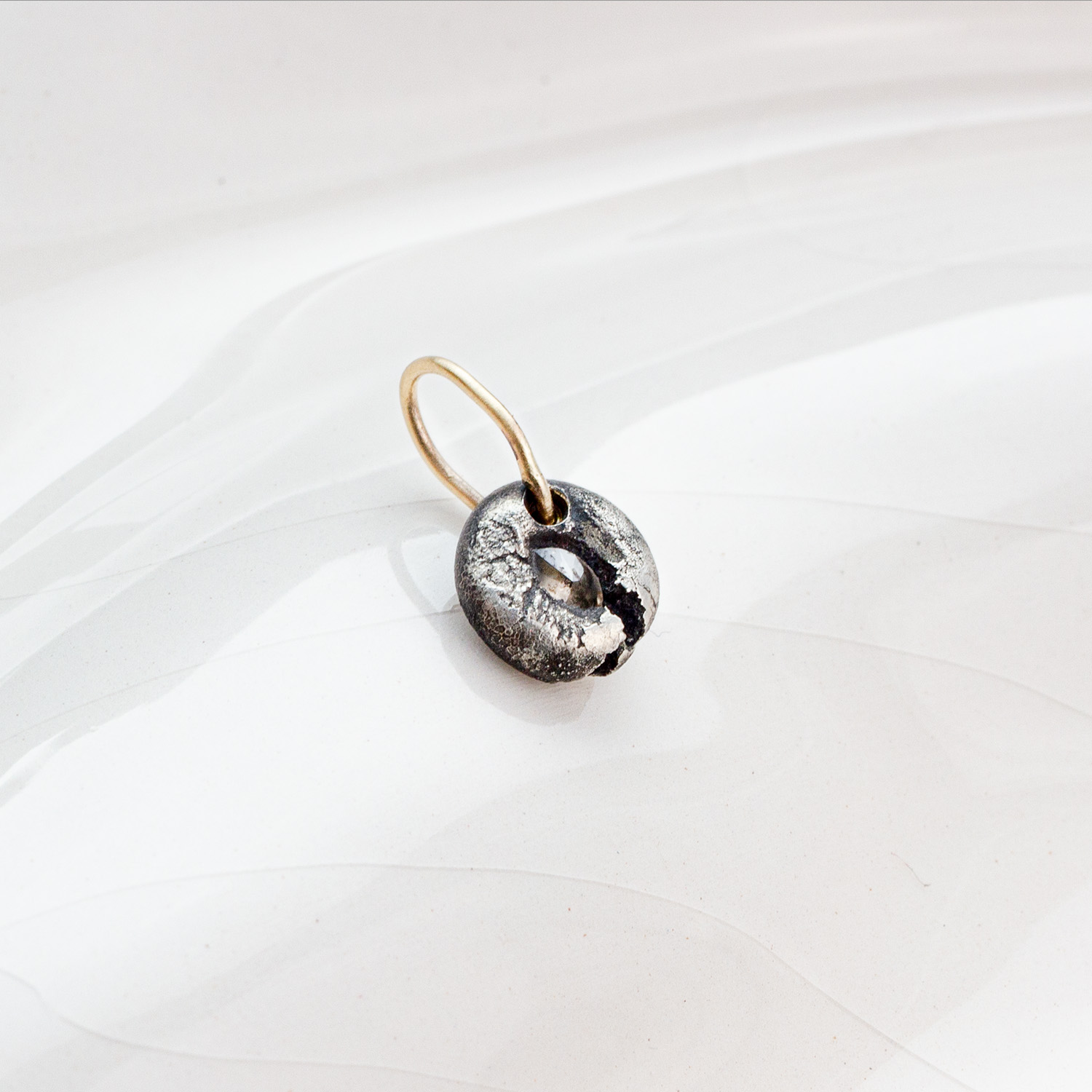 Eruption pendant in oxidised Argentium silver with salt and pepper diamond and 9ct gold bail, fully hallmarked, handmade by AMONTA jewellery