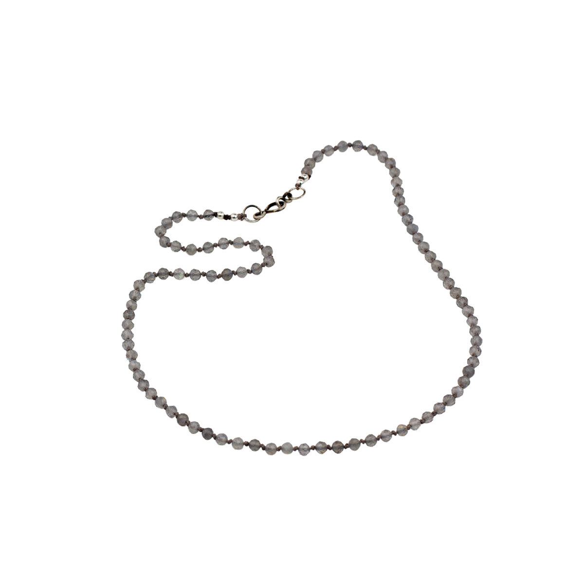 Hand knotted labradorite silk necklace by AMONTA jewellery with oxidised sterling silver hallmarked clasp on natural silk