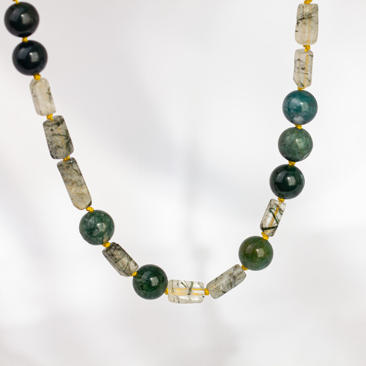 Hand-knotted moss agate and tourmalinated quartz unisex necklace on golden silk with sterling silver clasp